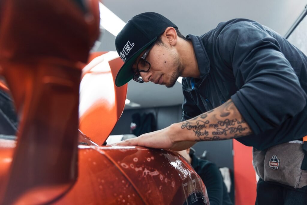 mechanic checking car